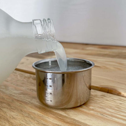 Doseur lessive liquide
